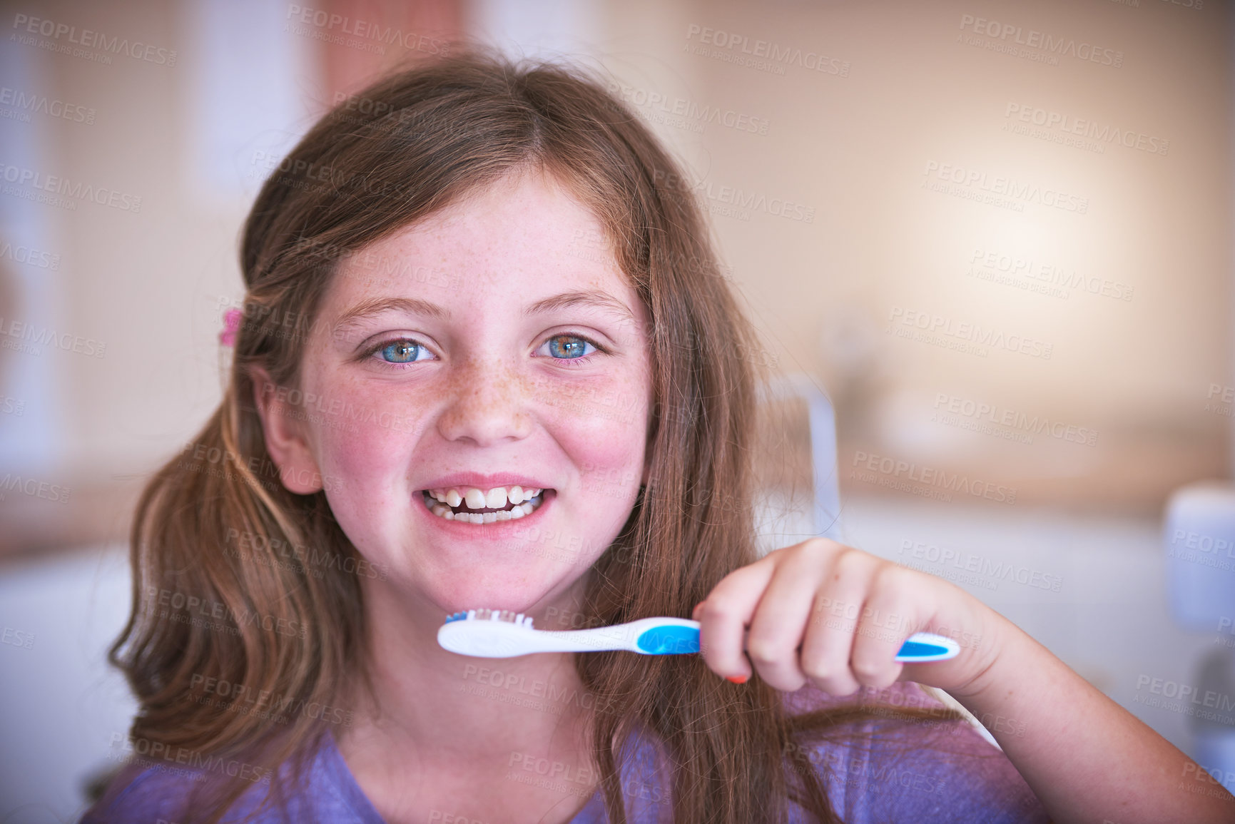 Buy stock photo Cropped shot of a little girl brushing her teeth