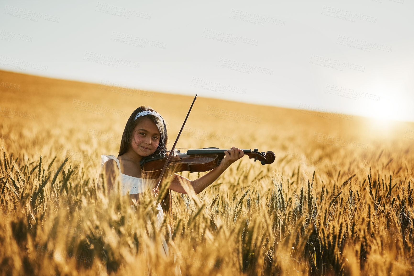 Buy stock photo Portrait, kid and violin in nature for music, talent and creativity or practice in field. Performance, musician and girl in countryside for entertainment, learning or outdoor for development or art 