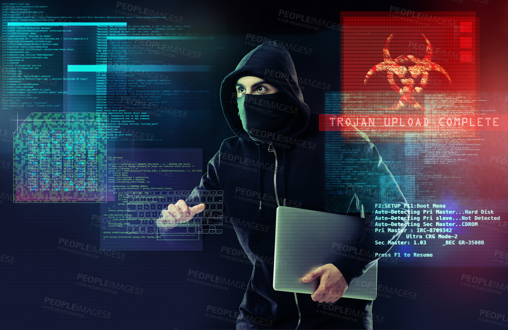 Buy stock photo Shot of a computer hacker holding a laptop while standing against a dark background