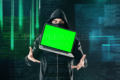 Buy stock photo Shot of a computer hacker levitating a laptop while standing against a dark background