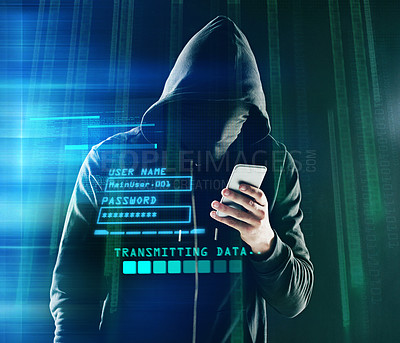 Buy stock photo Shot of an unidentifiable computer hacker using a smartphone while standing against a dark background