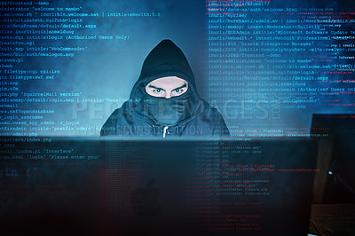 Buy stock photo Shot of a young hacker using a computer late at night