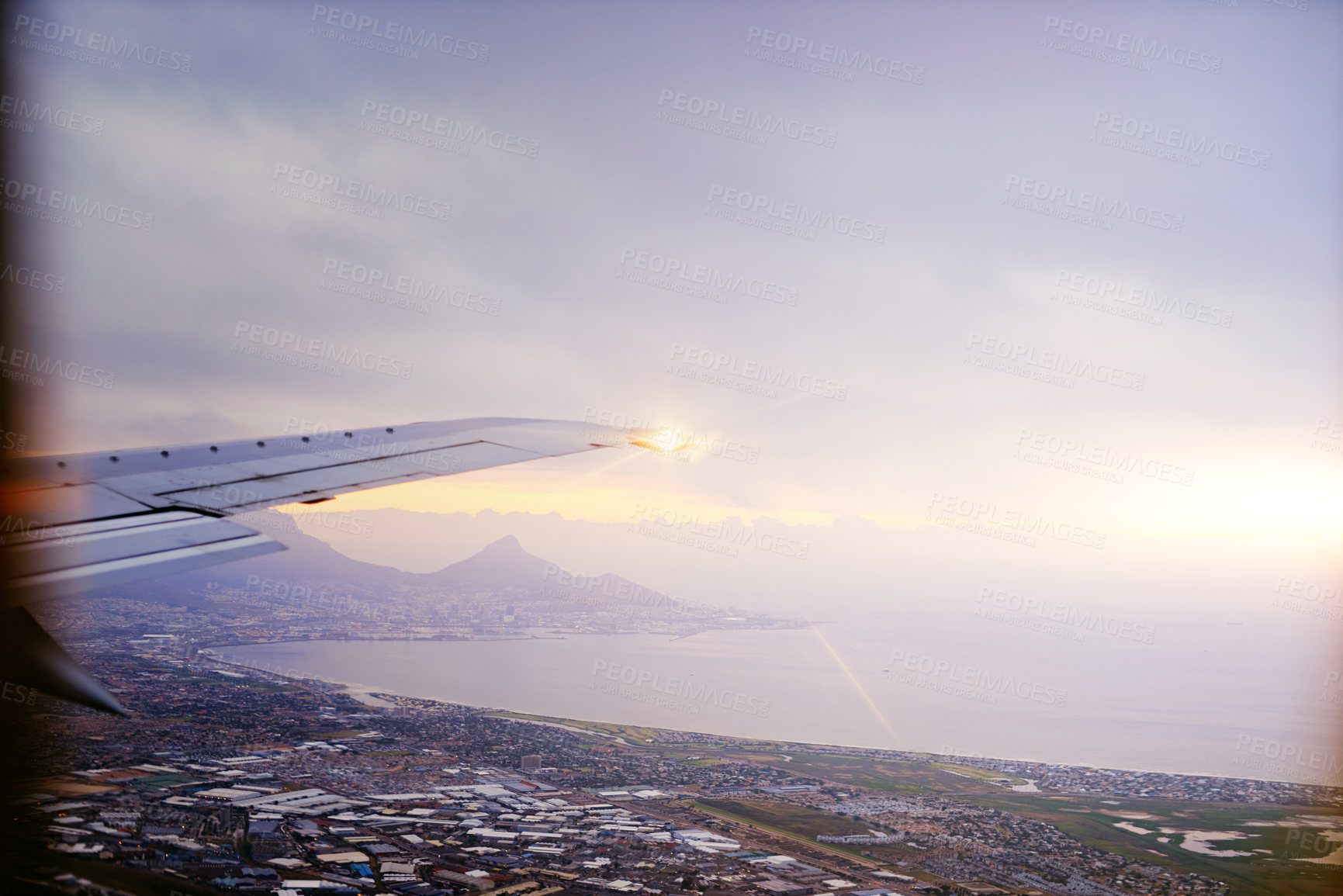 Buy stock photo Shot of a scenic view through an airplane window