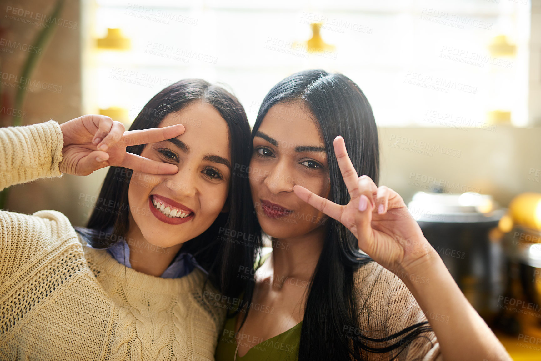 Buy stock photo Women, friends and portrait with peace sign in coffee shop together with smile for communication and conversation. Emoji, hands and gesture in cafe with pride, happiness and gen z people in New York