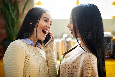 Buy stock photo Cropped shot of two young friends hanging out together