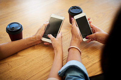 Buy stock photo Communication, hands and people with cellphone and coffee typing email, text message or post in cafe. Technology, contact and women with cappuccino and phone for networking on internet in restaurant.