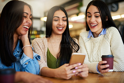 Buy stock photo Cropped shot of a group of young friends hanging out in a cafe