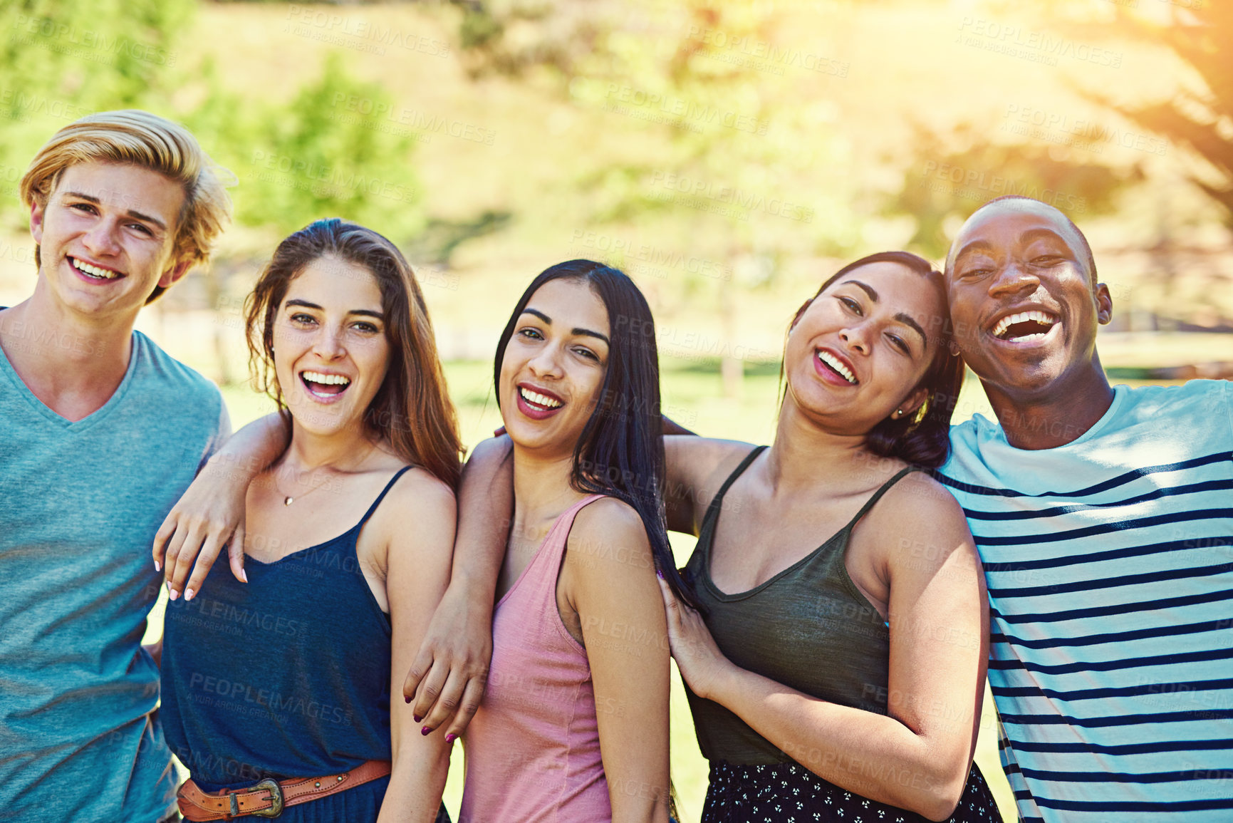 Buy stock photo Diversity, happy and friends in portrait in park for hanging out, chilling and bonding together. People, men or women with smile outdoor in vacation, holiday and adventure in nature with hug in Spain