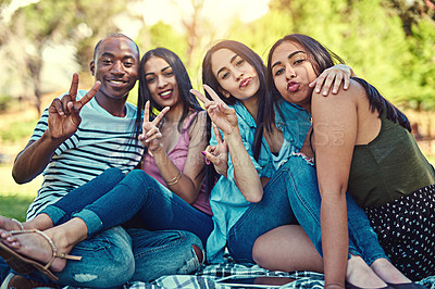 Buy stock photo Shot of young people enjoying a holiday