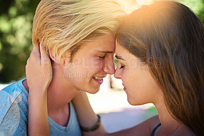 Buy stock photo Couple, hug and smile outdoor for happiness, love and time together while walking in summer. Man, woman and support while on date in nature for connection, care and commitment with flare in Miami