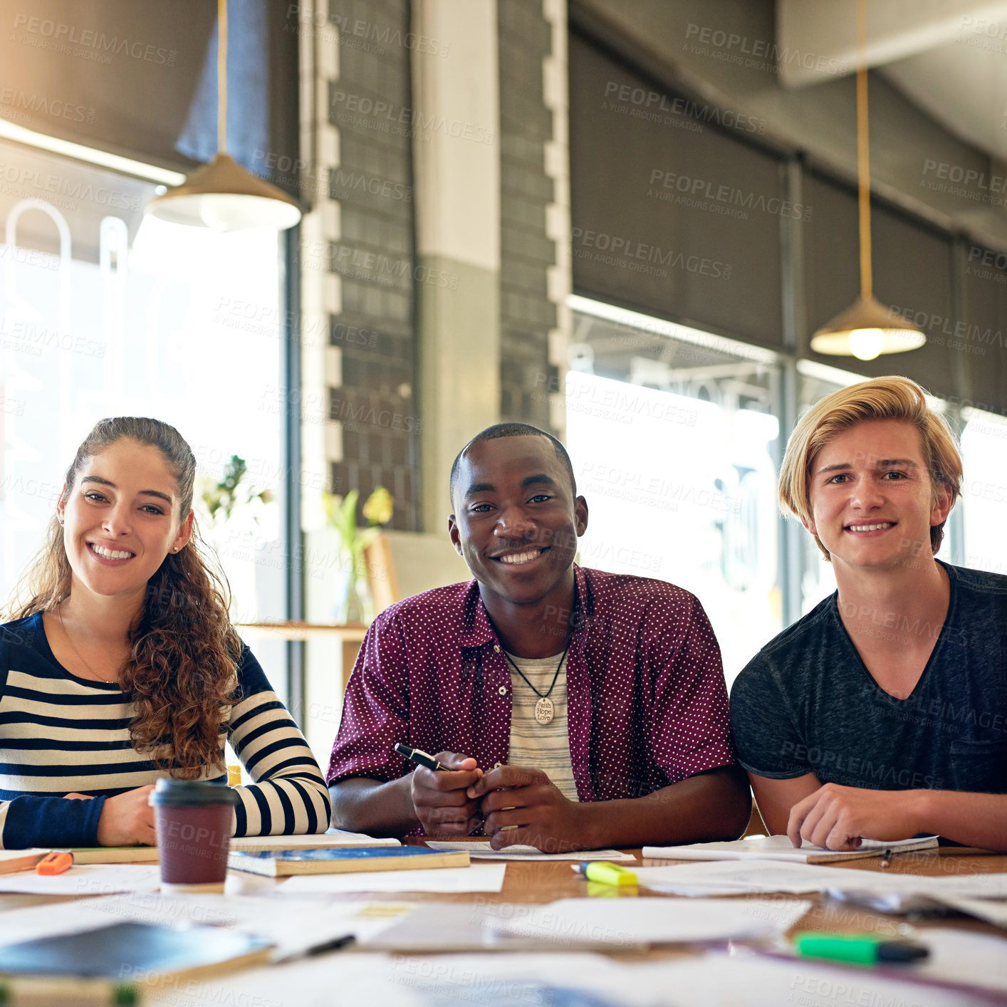 Buy stock photo Portrait of a group of happy students having a study session in a cafe