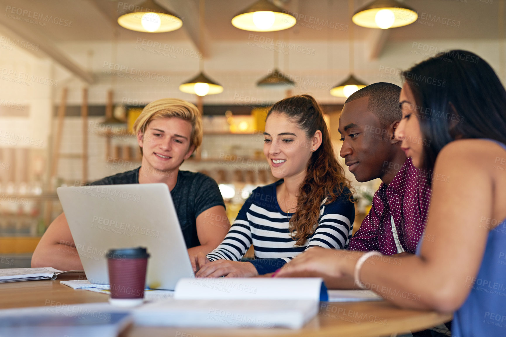 Buy stock photo Education, laptop and study with friends in library of college or university together for assignment. Book, computer and smile with group of young people at school table for development or learning