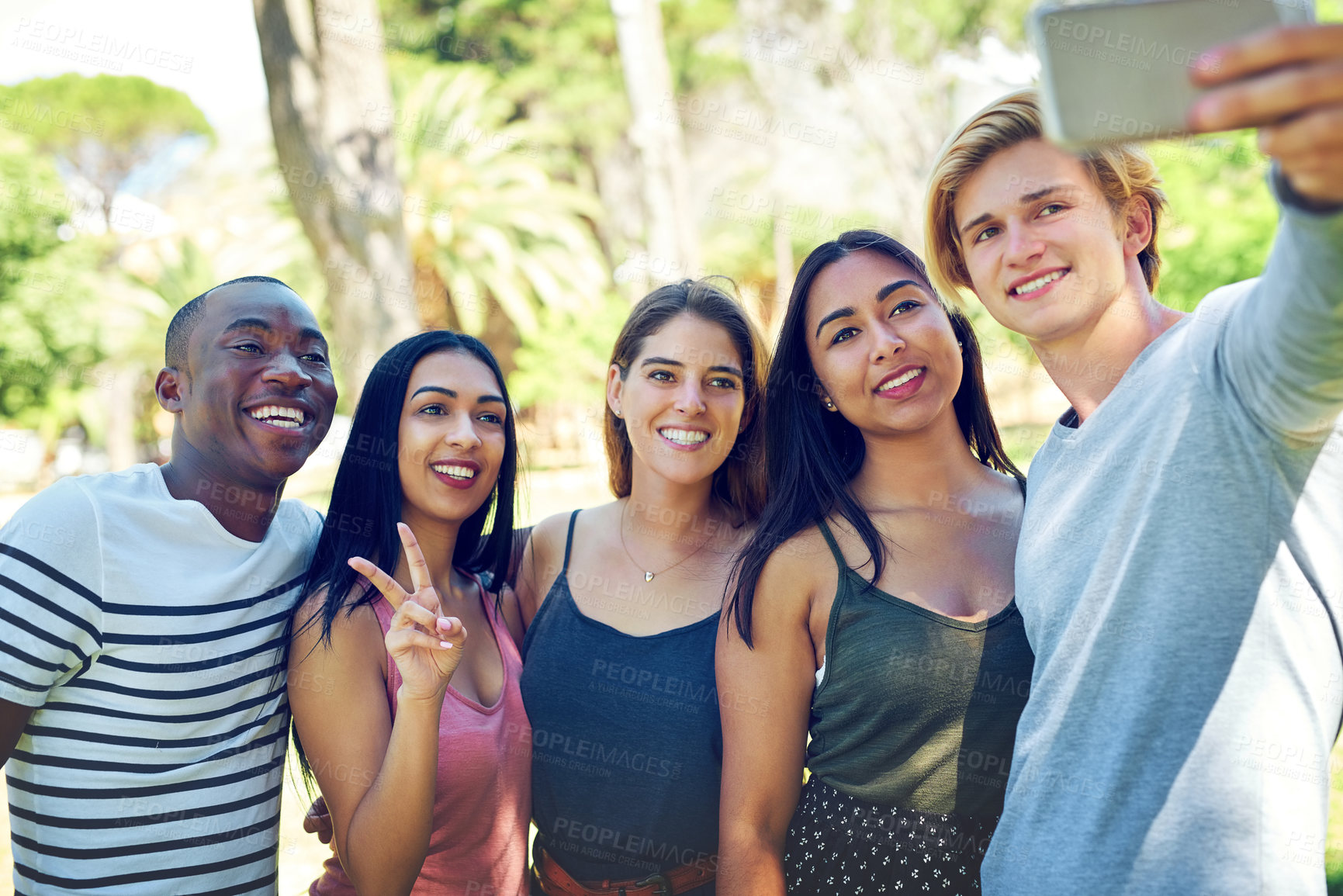 Buy stock photo Friends, students and selfie in park, happy and diversity with solidarity, memory and profile picture. Women, men and group of people for photography, live stream or post on social network at college