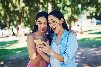 Buy stock photo Women, friends and phone in park with surprise for exam results, email or notification for scholarship. Girl, students and smartphone with hug, support and excited for goals with college assessment