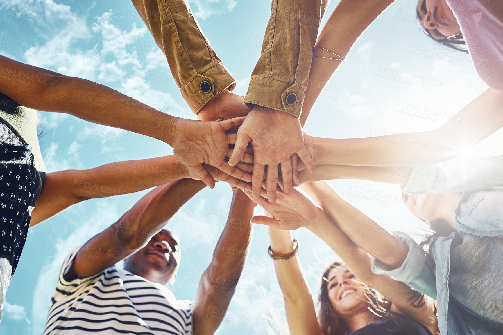 Buy stock photo Team building, hands and low angle of business people in solidarity or partnership on blue sky background. Teamwork, agreement and below hand collaboration for motivation, help or friends celebration