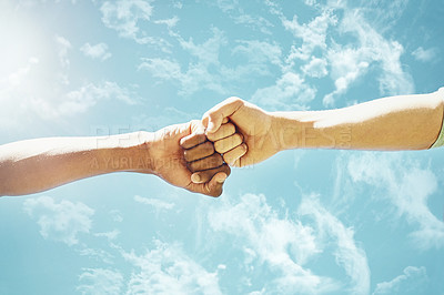 Buy stock photo Fist bump, people and blue sky with motivation, success and teamwork outdoor. Support, friends and winning hand sign in summer with celebration and agreement showing solidarity in nature from victory