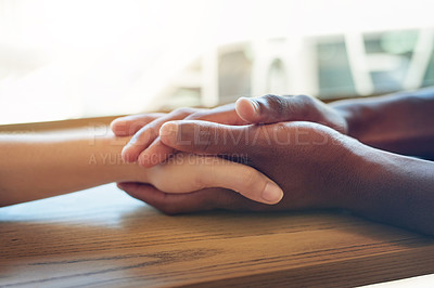 Buy stock photo Holding hands, interracial and together for support, connection and trust in community with respect. Friends, people and empathy for relationship, kindness and praying for spiritual practice