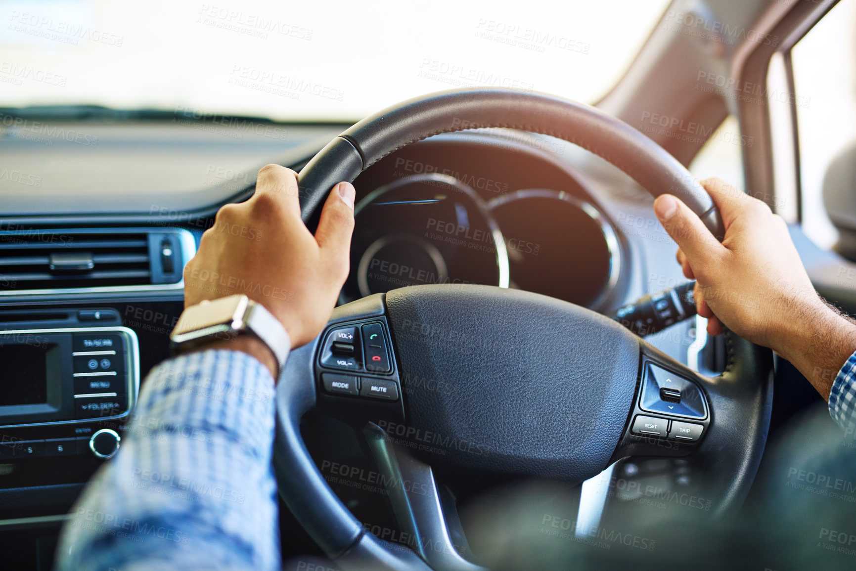 Buy stock photo Cropped shot of an unidentifiable man driving a car