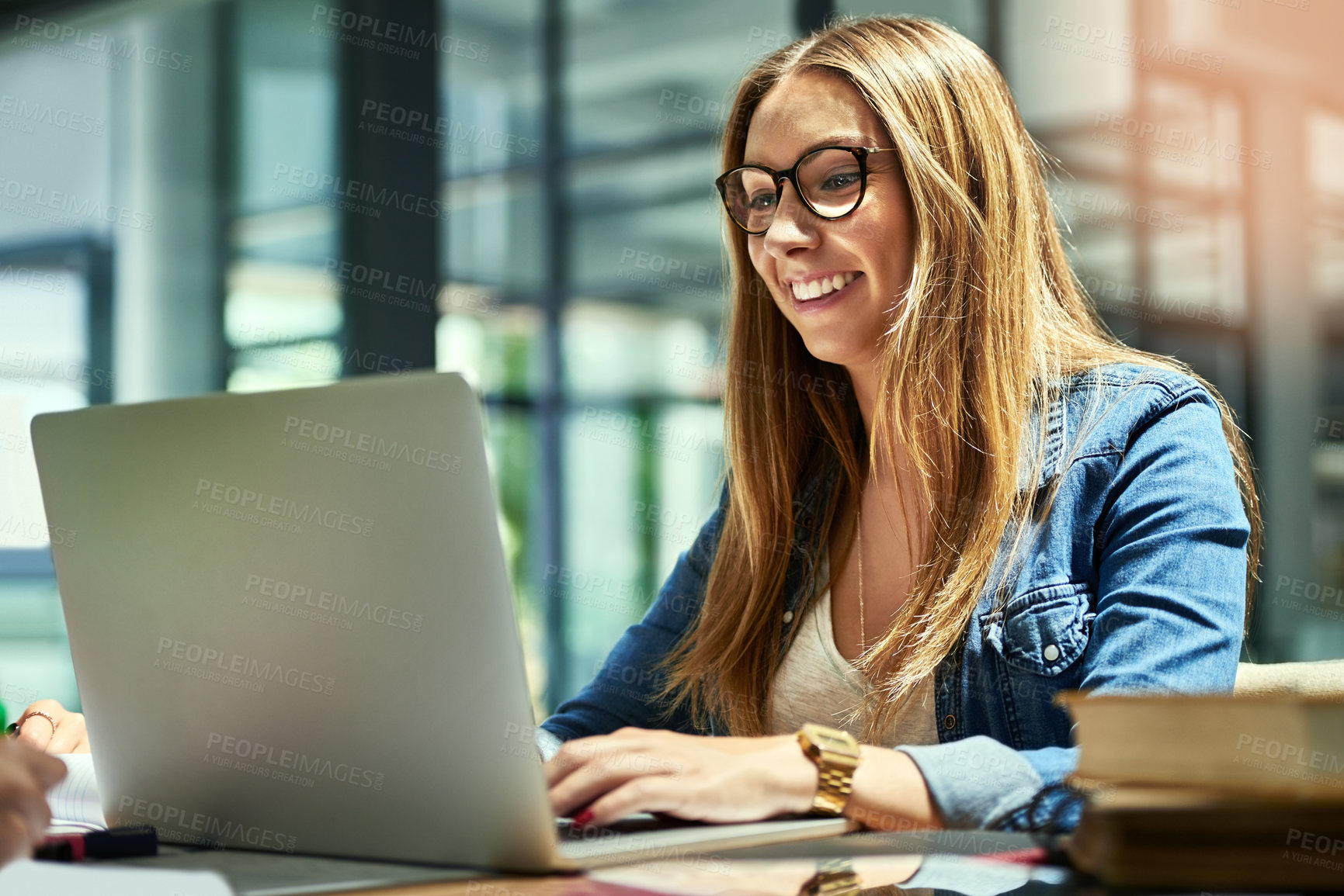 Buy stock photo Student, girl and laptop at college for online education, research and typing essay for English assignment. Young person on computer for studying literature, scholarship and language in university