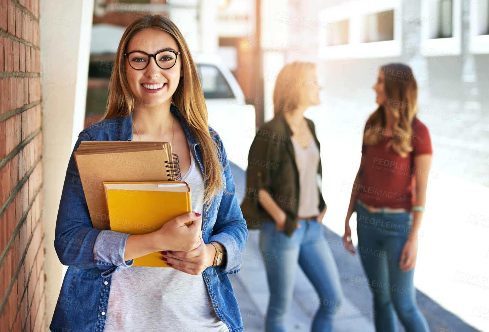 Buy stock photo Woman, portrait and university student with books on campus for education, scholarship or academy. Female person, friends and academic knowledge with future learning or college, project or school