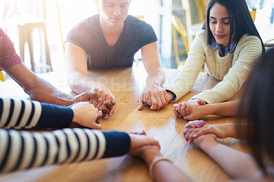 Buy stock photo Support group, holding hands and people at table in cafe for collaboration, community and solidarity. Comfort, diversity and men and women for meeting, therapy and team building in restaurant