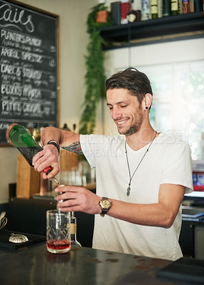 Buy stock photo Man, cocktail and bartender pouring for order, service and alcohol at social lounge in nightclub. Barman, smile and bottle of liquor, spirits and discount for drinks at happy hour event in pub