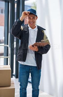 Buy stock photo Portrait of a courier making a delivery in an office