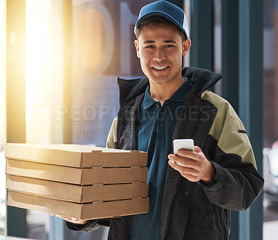 Buy stock photo Portrait of a young man making a pizza delivery in an office