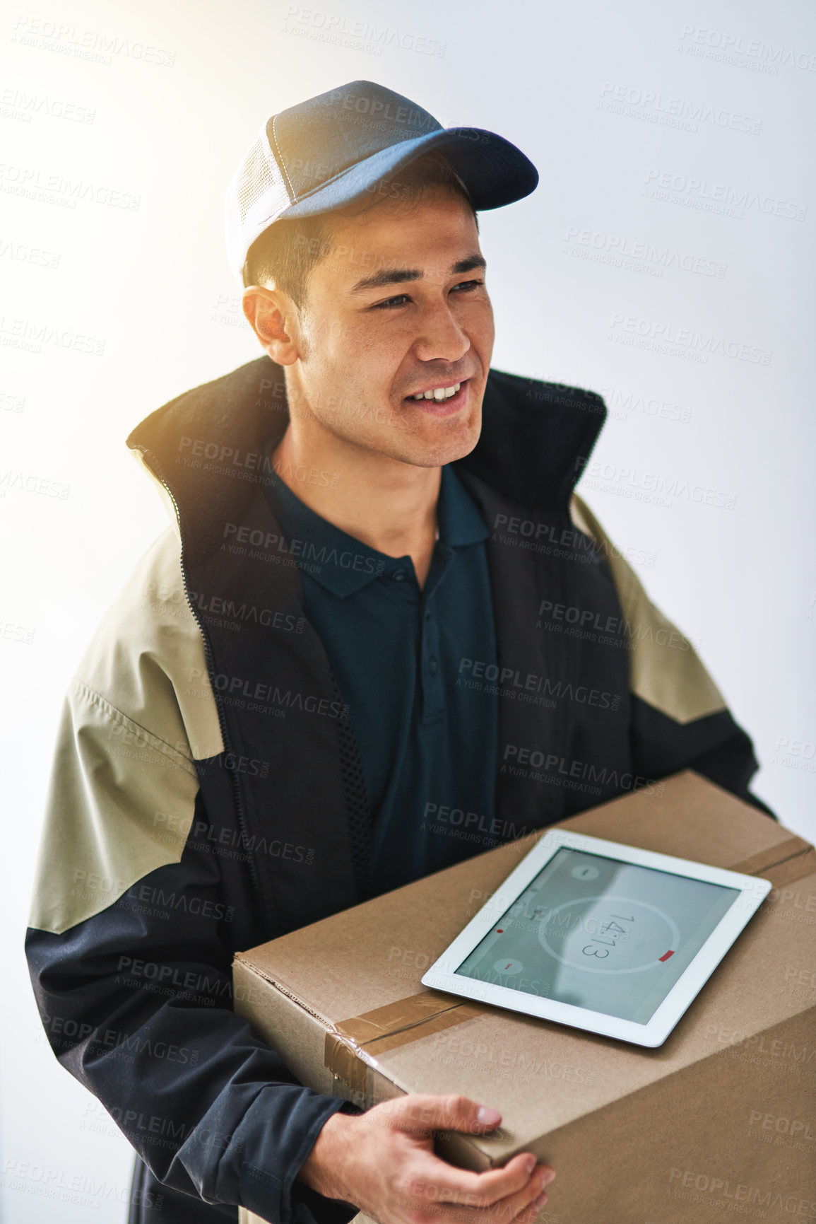 Buy stock photo Cropped shot of a courier making a delivery