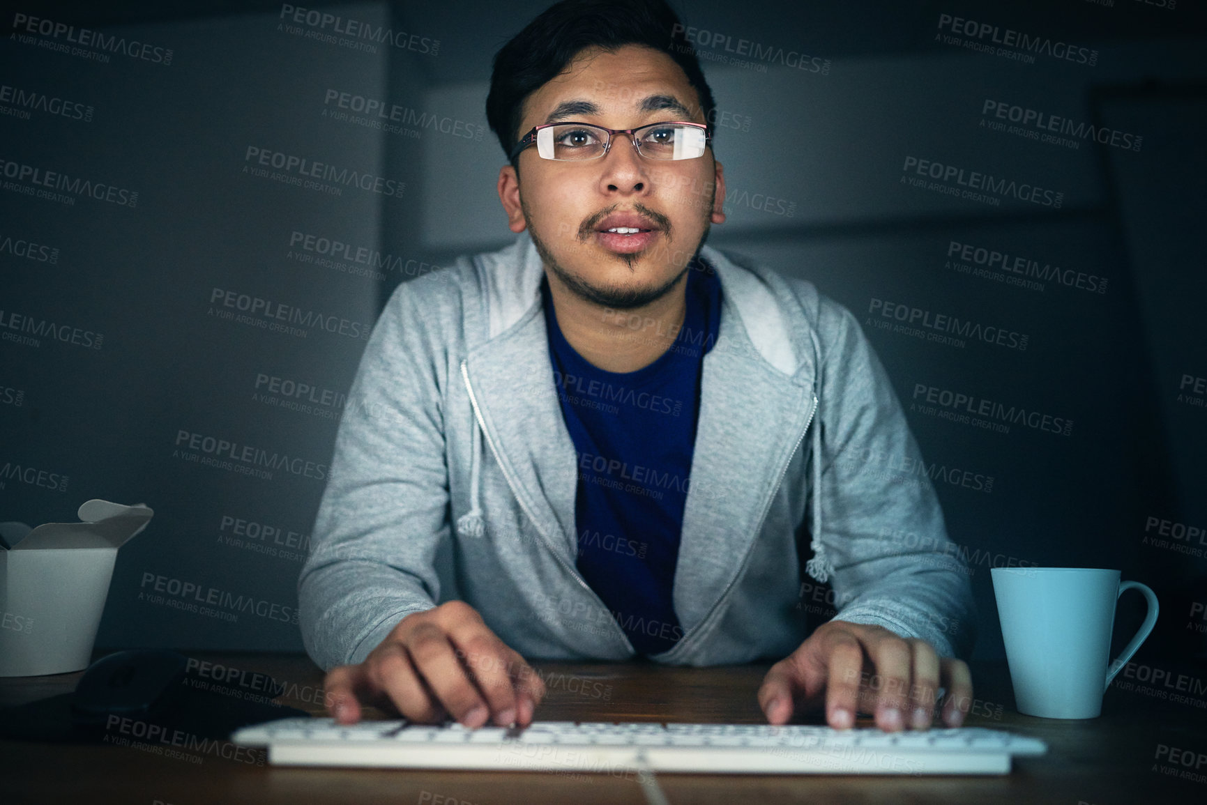 Buy stock photo Man, computer and keyboard at night in office of data coding, problem solving or software design as Developer. Male programmer, pc and typing for update, IT maintenance or working late for deadline