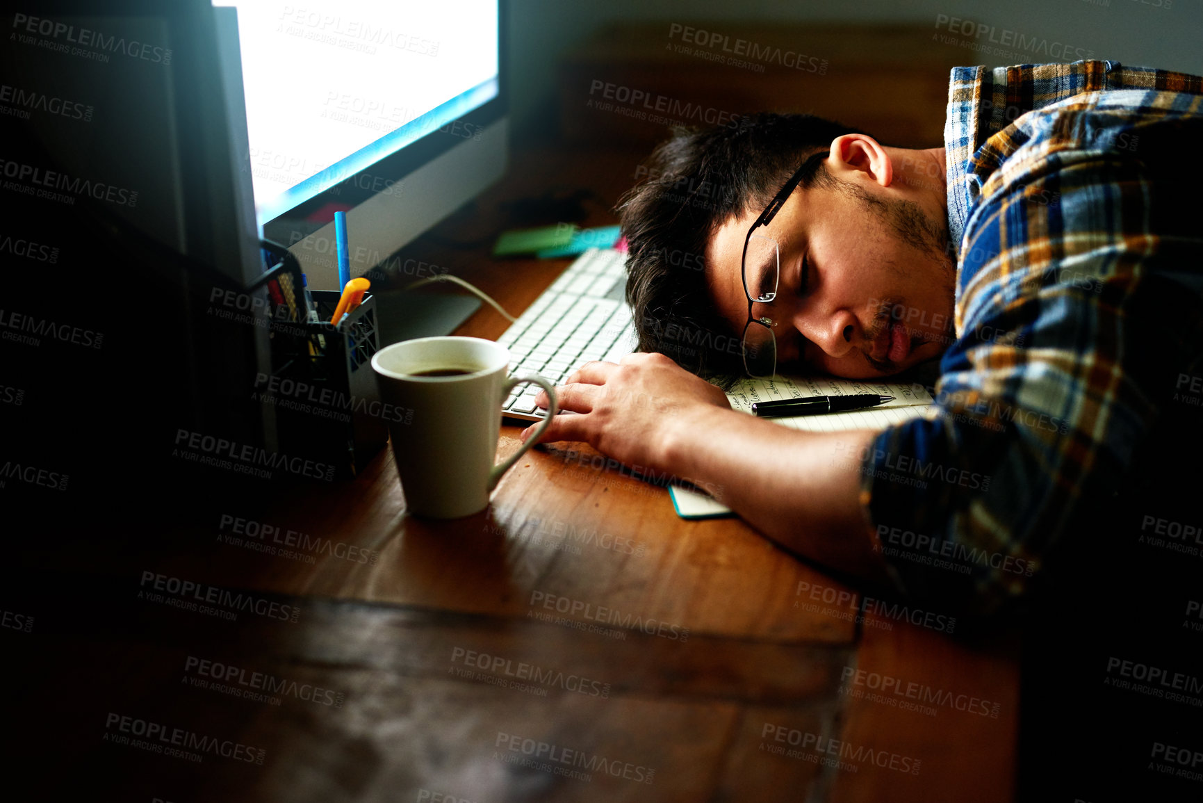 Buy stock photo Tired man, night and sleeping with computer on desk in stress, burnout or fatigue at office. Male person or employee asleep, rest or bored in depression or overworked on project deadline at workplace