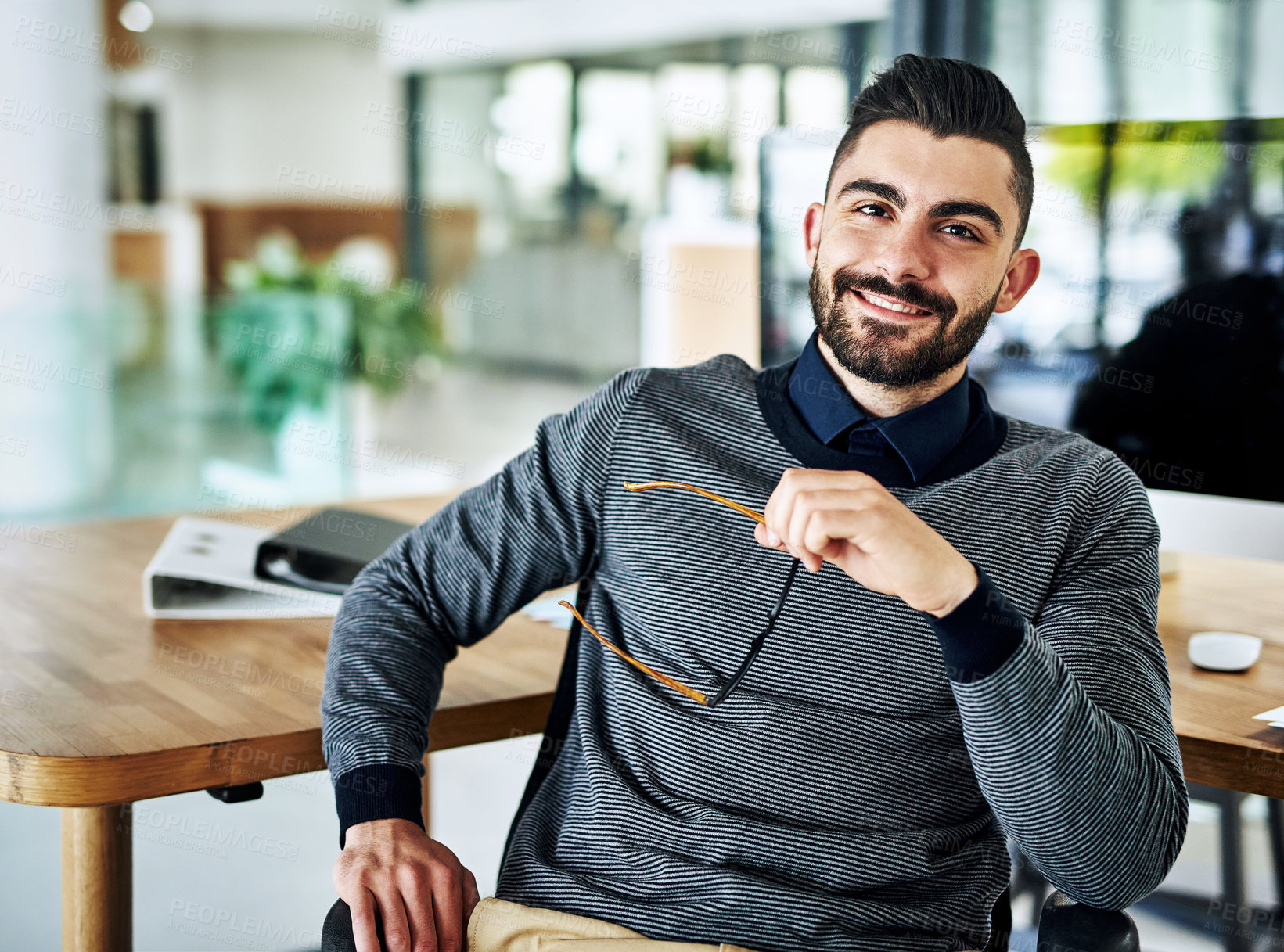 Buy stock photo Desk, confident and portrait of business man in office with company pride, glasses and smile. Creative startup, professional agency and person for career, ambition and job for digital marketing