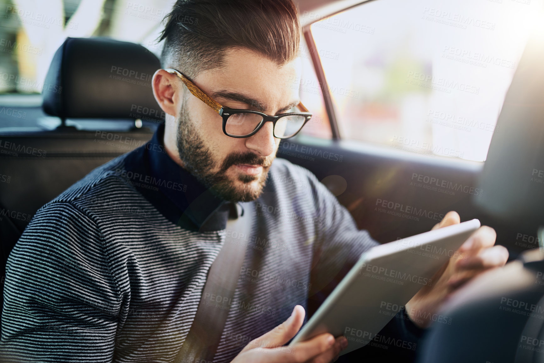 Buy stock photo Businessman, tablet and travel in car for networking, streaming and communication in city. Connection, online and reading with technology for stock market or ebook for work and career research
