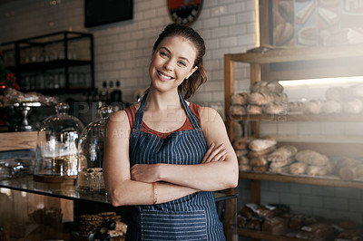 Buy stock photo Portrait of a confident young woman working in a coffee shop