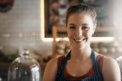 Buy stock photo Portrait of a confident young woman working in a coffee shop