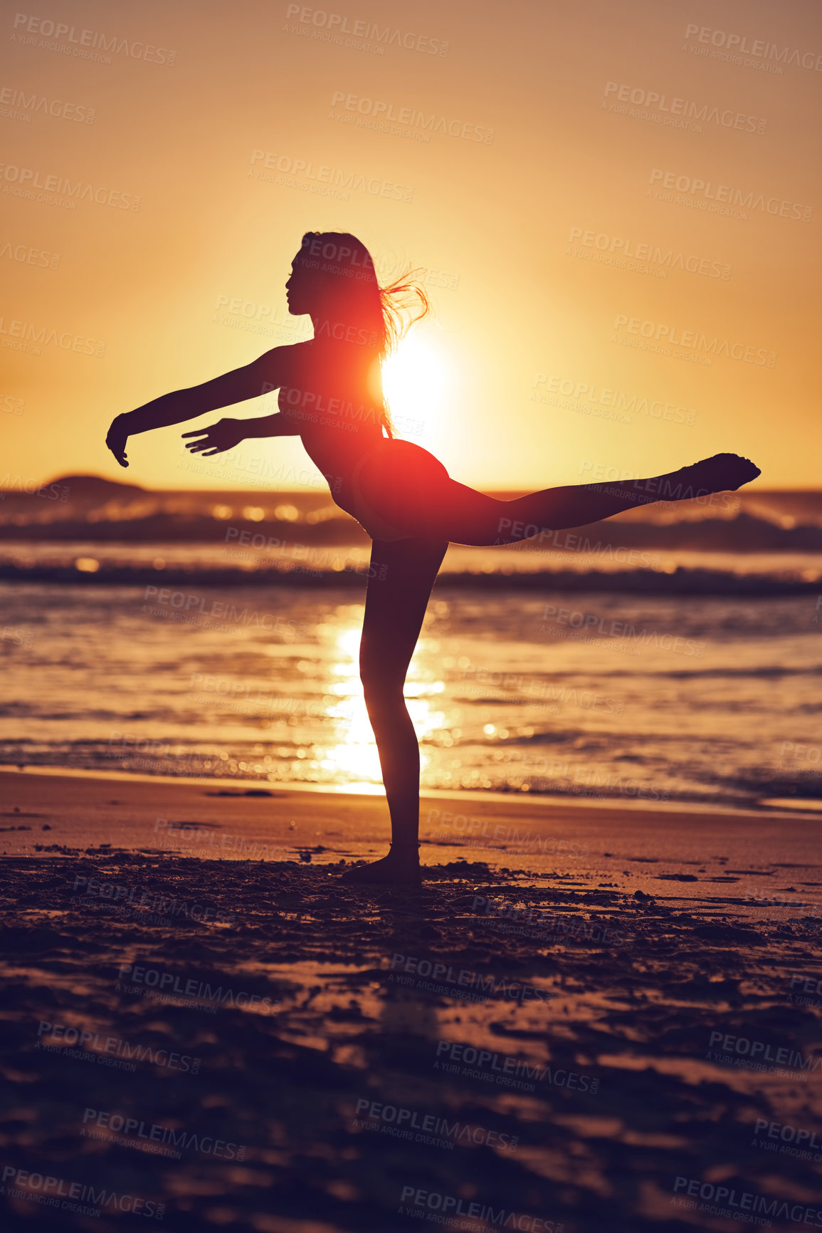 Buy stock photo Woman, sunset and dancing silhouette on beach, contemporary ballet and energy in nature with dancer. Wellness, freedom and movement on summer vacation, seashore and water with horizon lens flare