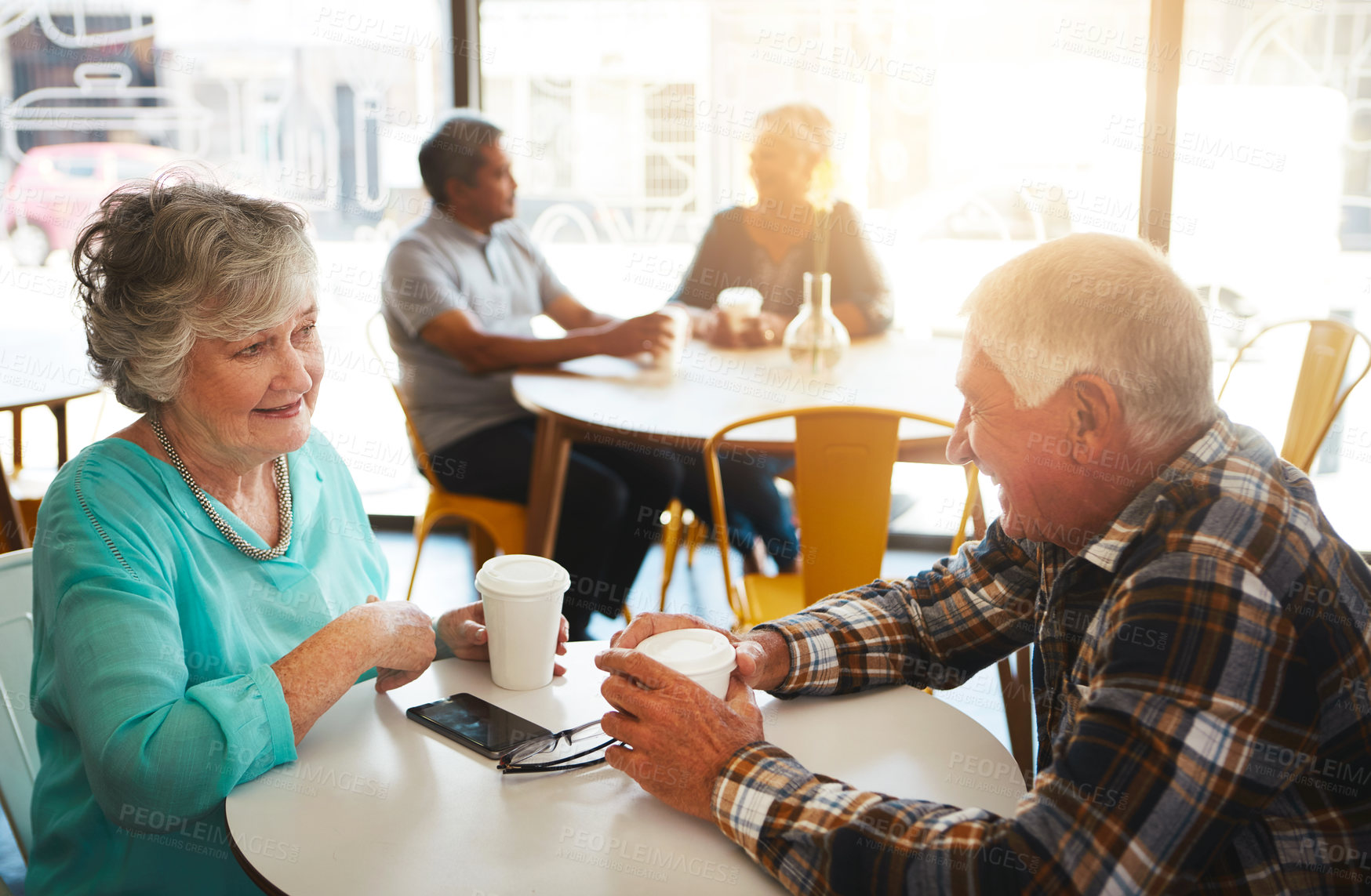 Buy stock photo Senior couple, cafe and talking together, relationship bonding and discussion for retirement plan with married people. Break, restaurant meal and conversation and table, coffee and sitting or caring