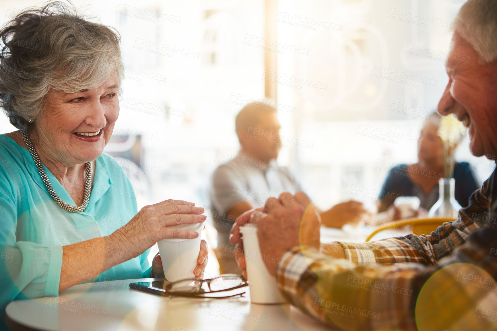 Buy stock photo Senior couple, coffee shop and talking together, relationship bonding and discussion for retirement plan with married people. Break, restaurant meal and conversation and table, sitting and care