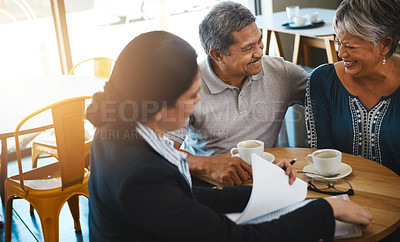 Buy stock photo Shot of a senior couple meeting up with a financial advisor