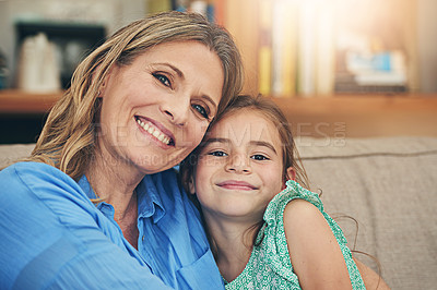 Buy stock photo Portrait of a happy mother and daughter spending time together at home
