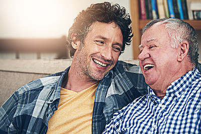 Buy stock photo Happy, relax and senior father with son on sofa for bonding, smile and conversation. Retirement, happiness and generations advice with family in living room at home for weekend, love and discussion