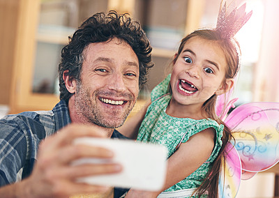 Buy stock photo Happy father, little girl and bonding with selfie for photography, picture or memory together at home. Dad, child or kid with smile or costume for capture, moment or childhood in living room at house