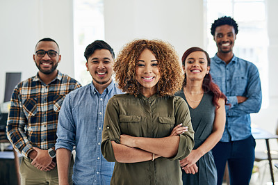 Buy stock photo Portrait of a team of happy and confident colleagues working in a modern office