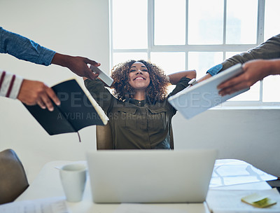 Buy stock photo Shot of a young woman taking a break during a demanding day at work