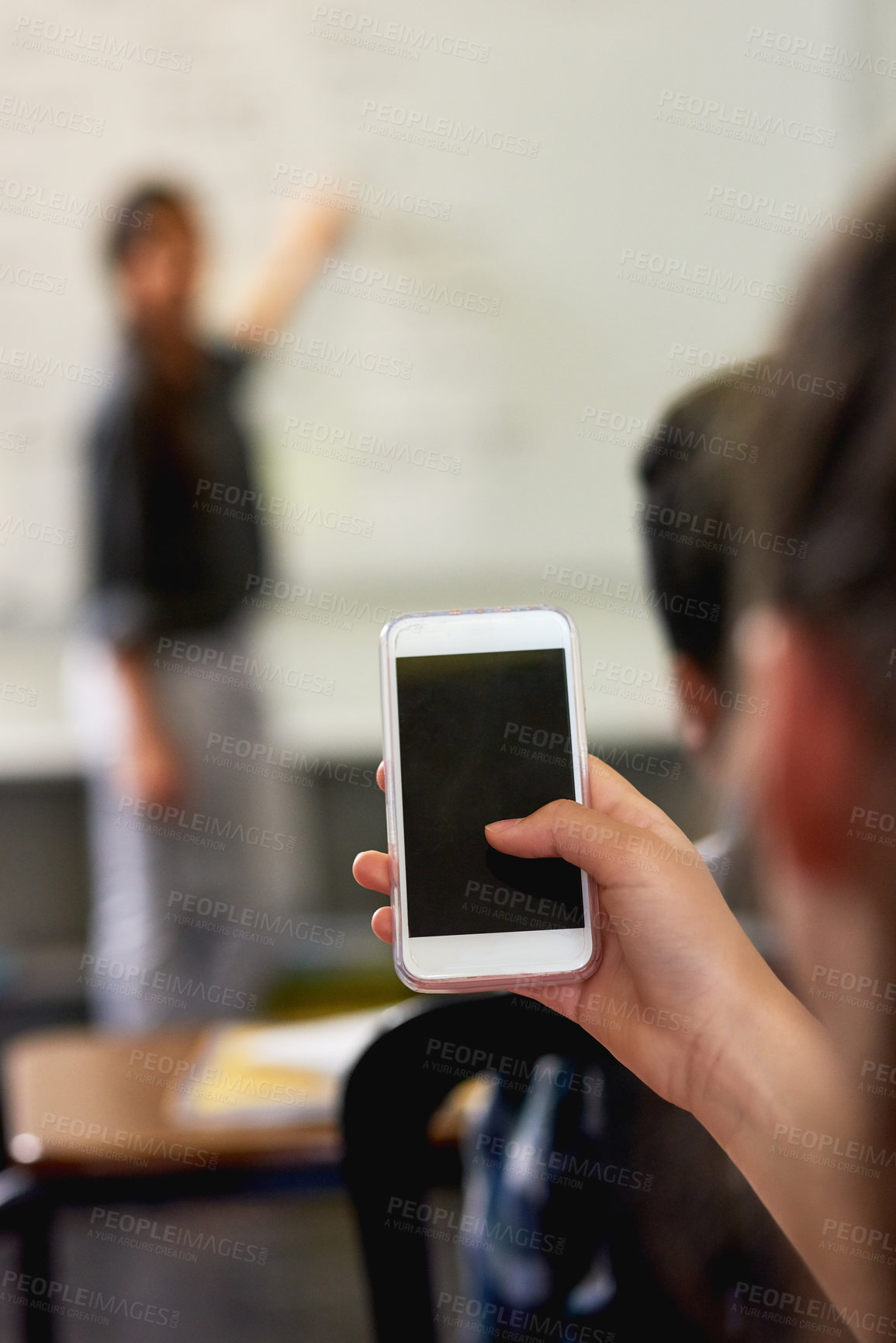 Buy stock photo Hand, smartphone and screen in classroom at school for elearning, education and teaching. Person, mockup space and advertising or internet for mobile app to study for research and information 