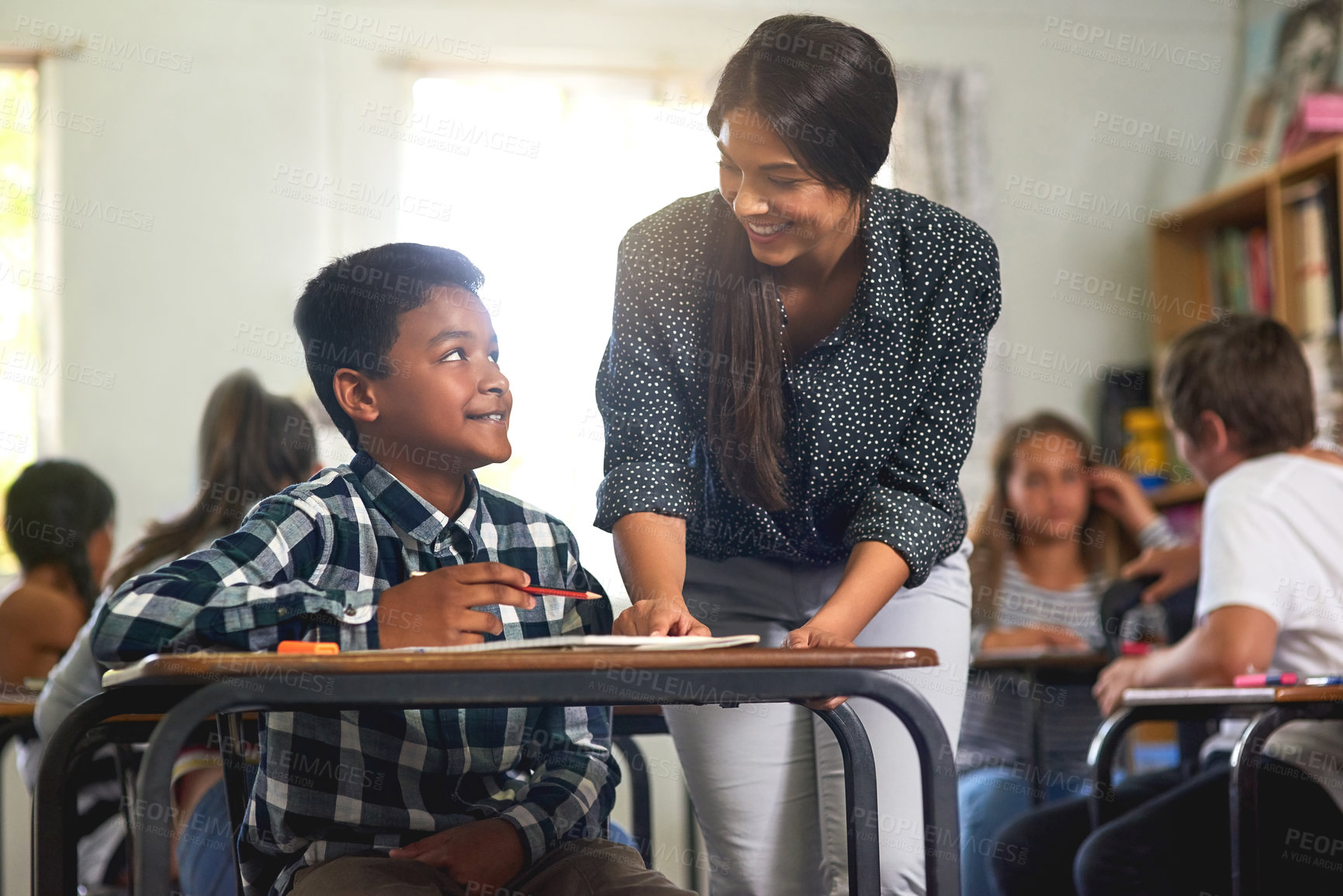 Buy stock photo Help, students and teacher in classroom, education and exam with knowledge, relax and conversation. Smile, people and educator with kids, child development or studying to prepare for test or learning