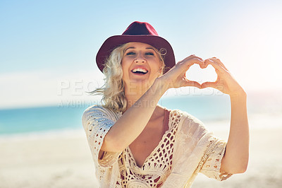 Buy stock photo Cropped  shot of a beautiful young woman spending the day at the beach