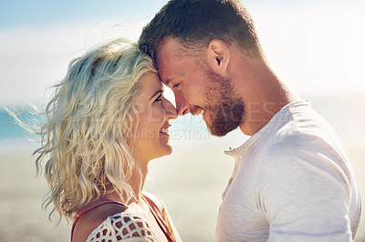 Buy stock photo Touch, face and couple on beach with love for seaside romance, serene vacation and ocean trip with affection. Man, woman and together for bonding by coast on weekend date, embrace and close with care