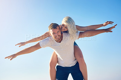 Buy stock photo Couple, love outdoor for summer and happy piggyback, freedom or vacation adventure together. Care, man and woman travel for romantic holiday, portrait or outside for engagement celebration with smile