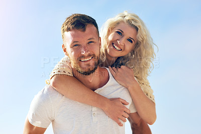 Buy stock photo Portrait, couple and piggyback outdoor with love for vacation romance, summer holiday and trip with affection. Man, woman and happiness for bonding on weekend date, embrace and support with care.